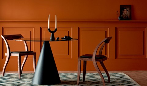 Bright orange paint on wall in dining area